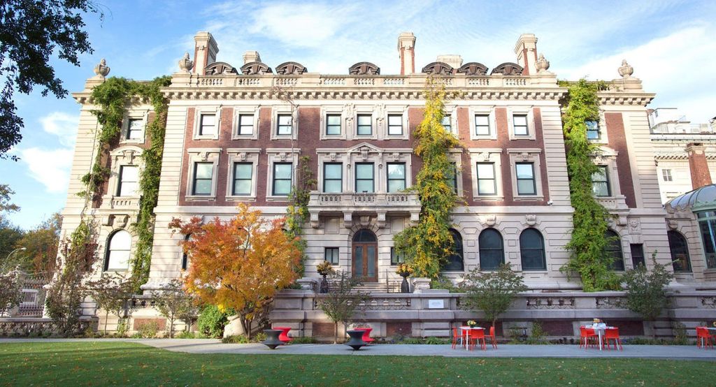 Image may contain City Urban Grass Plant Architecture Building Office Building Campus and High Rise