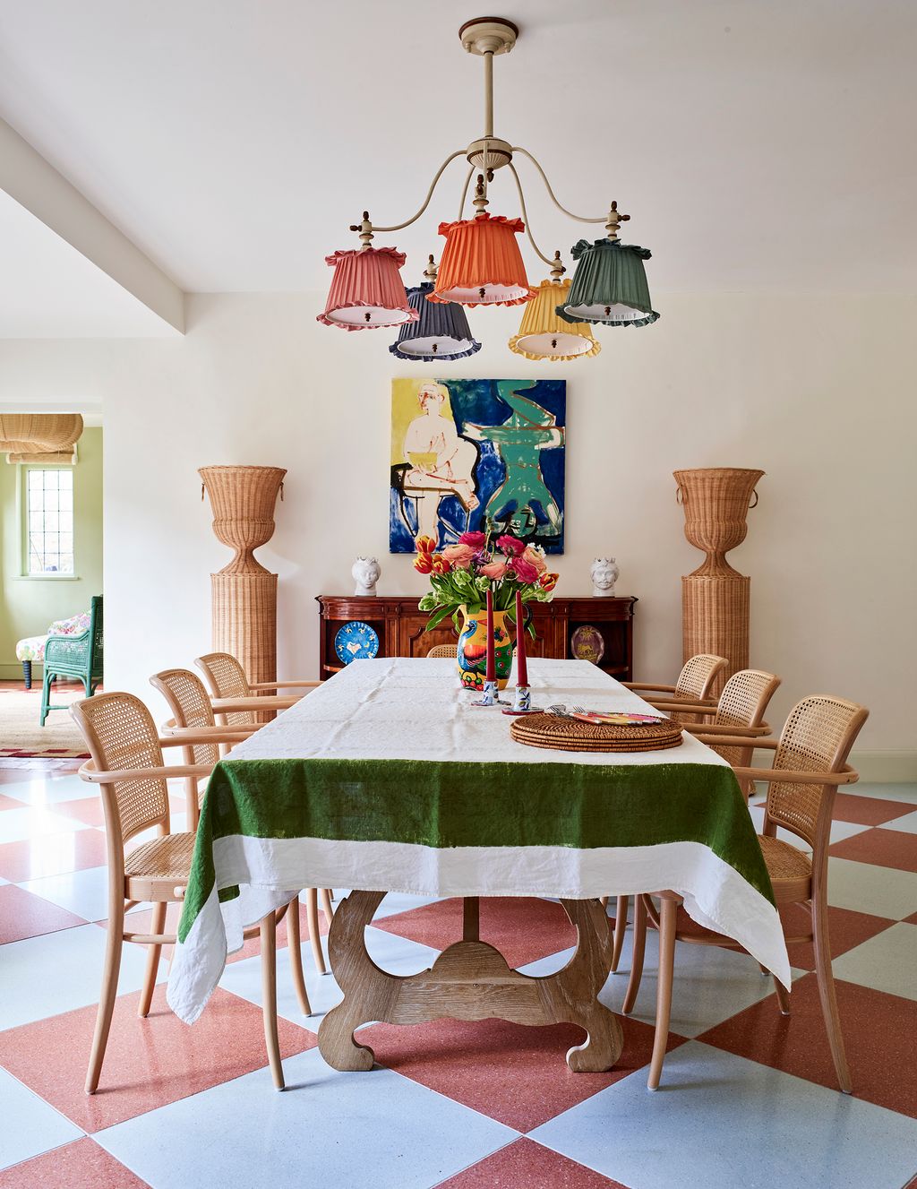 Image may contain Architecture Building Dining Room Dining Table Furniture Indoors Room Table Lamp Desk and Chair