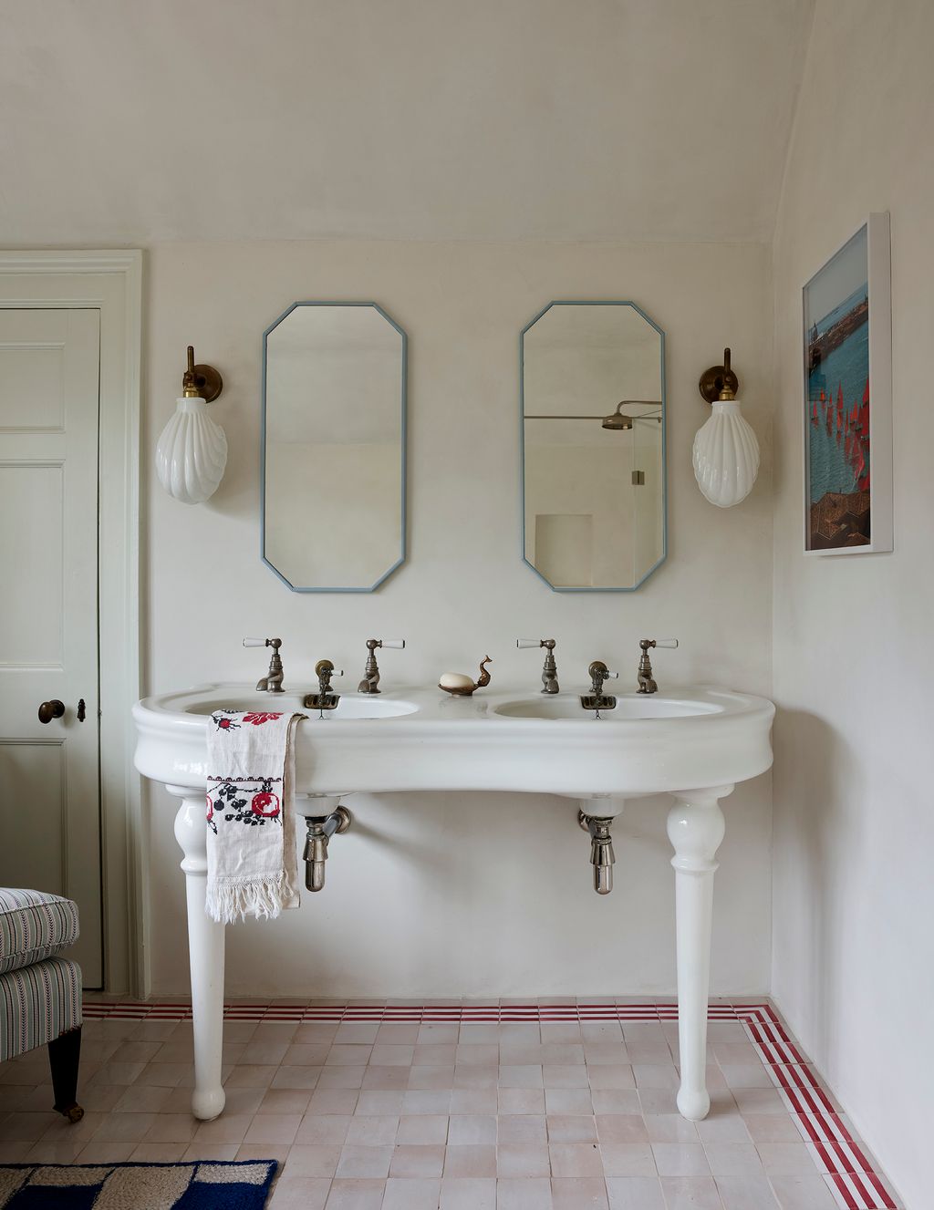 Image may contain Home Decor Rug Art Painting Sink Sink Faucet and Lamp