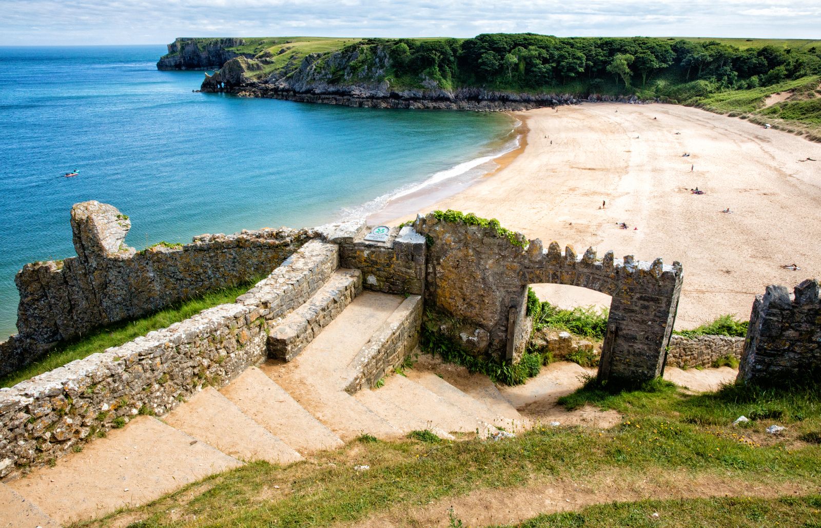 Image may contain Nature Outdoors Sea Water Scenery Rock Shoreline Coast Architecture Building and Castle