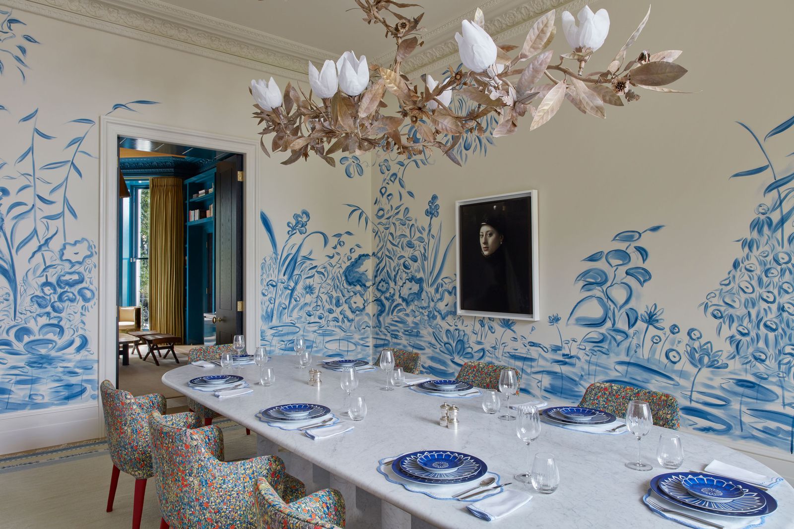 Image may contain Architecture Building Dining Room Dining Table Furniture Indoors Room Table Chandelier and Lamp