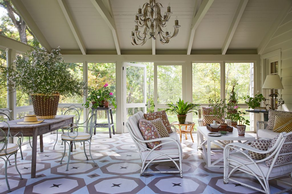 Image may contain Plant Home Decor Chandelier Lamp Furniture Table Architecture Building and Dining Room