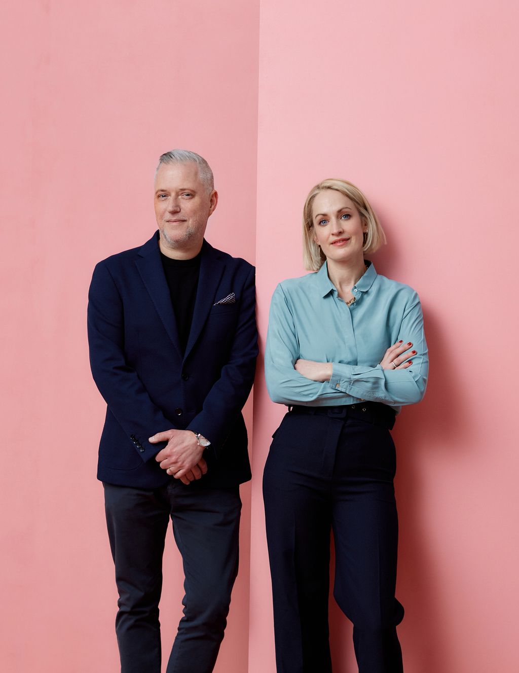 Image may contain Blazer Clothing Coat Jacket Adult Person Wristwatch Blonde and Hair