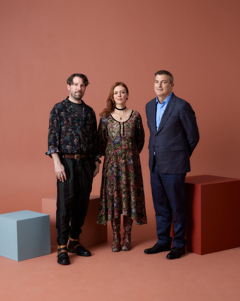 Image may contain Groupshot Person Adult Clothing Footwear Shoe Accessories Belt Coat Jacket Jewelry and Necklace