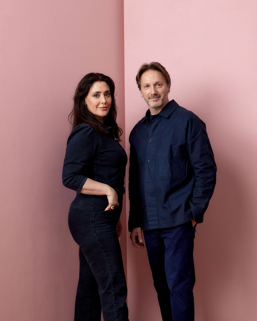 Image may contain Clothing Pants Adult Person Face Happy Head Smile and Jeans