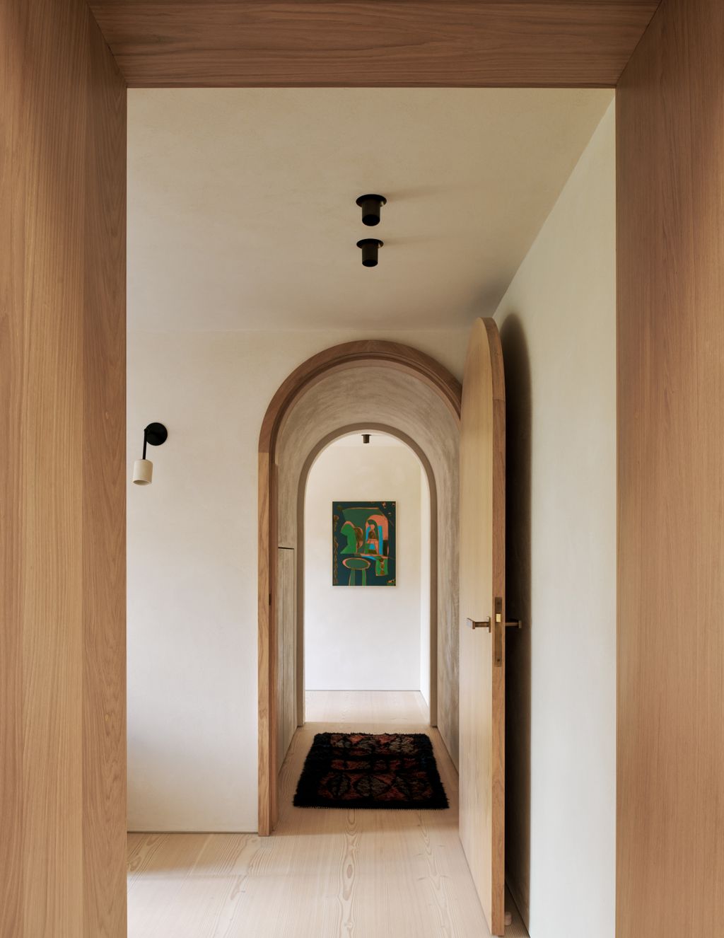 Image may contain Indoors Interior Design Home Decor Rug Lamp Architecture Building Corridor and Hallway