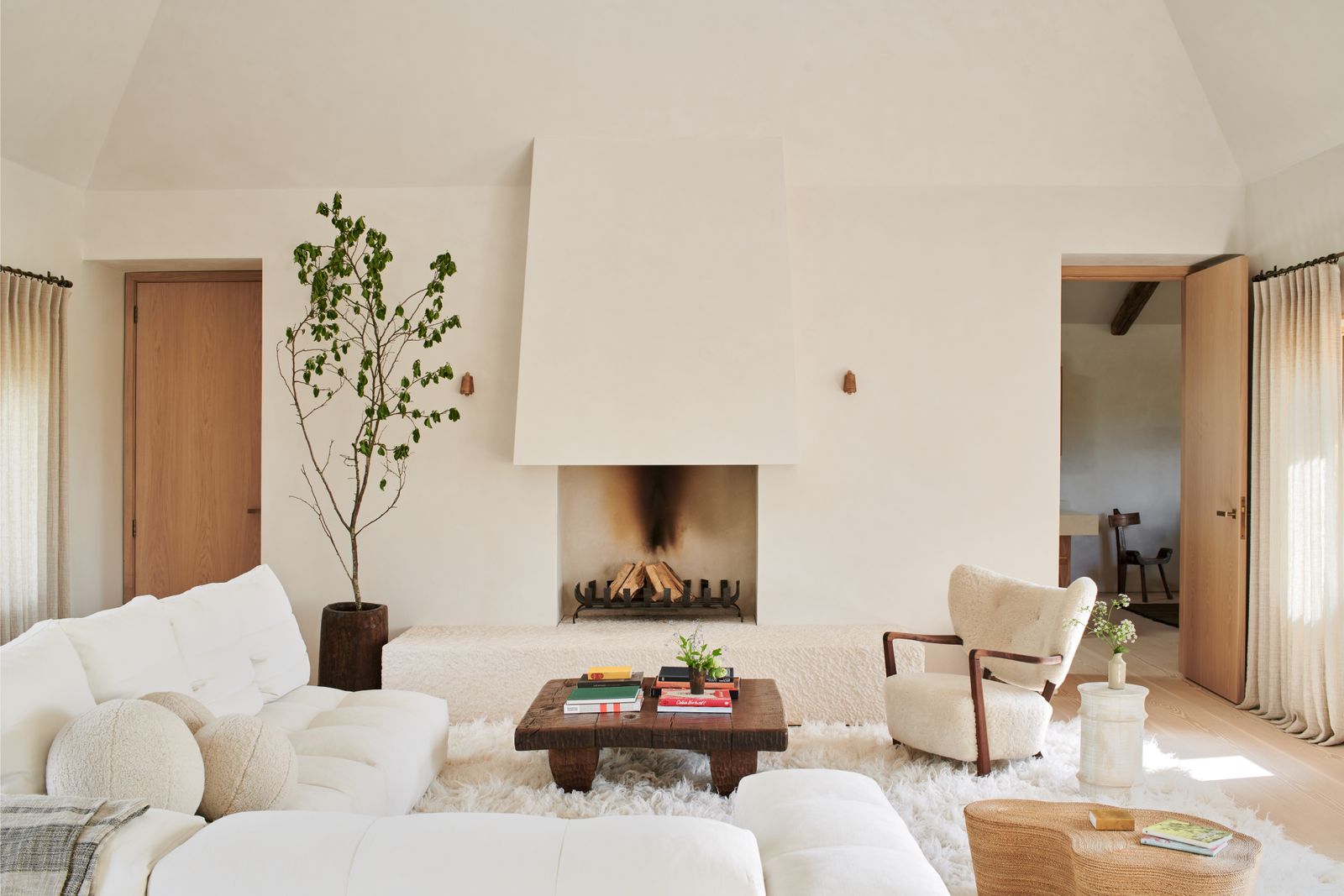 Image may contain Home Decor Architecture Building Furniture Indoors Living Room Room Book and Publication