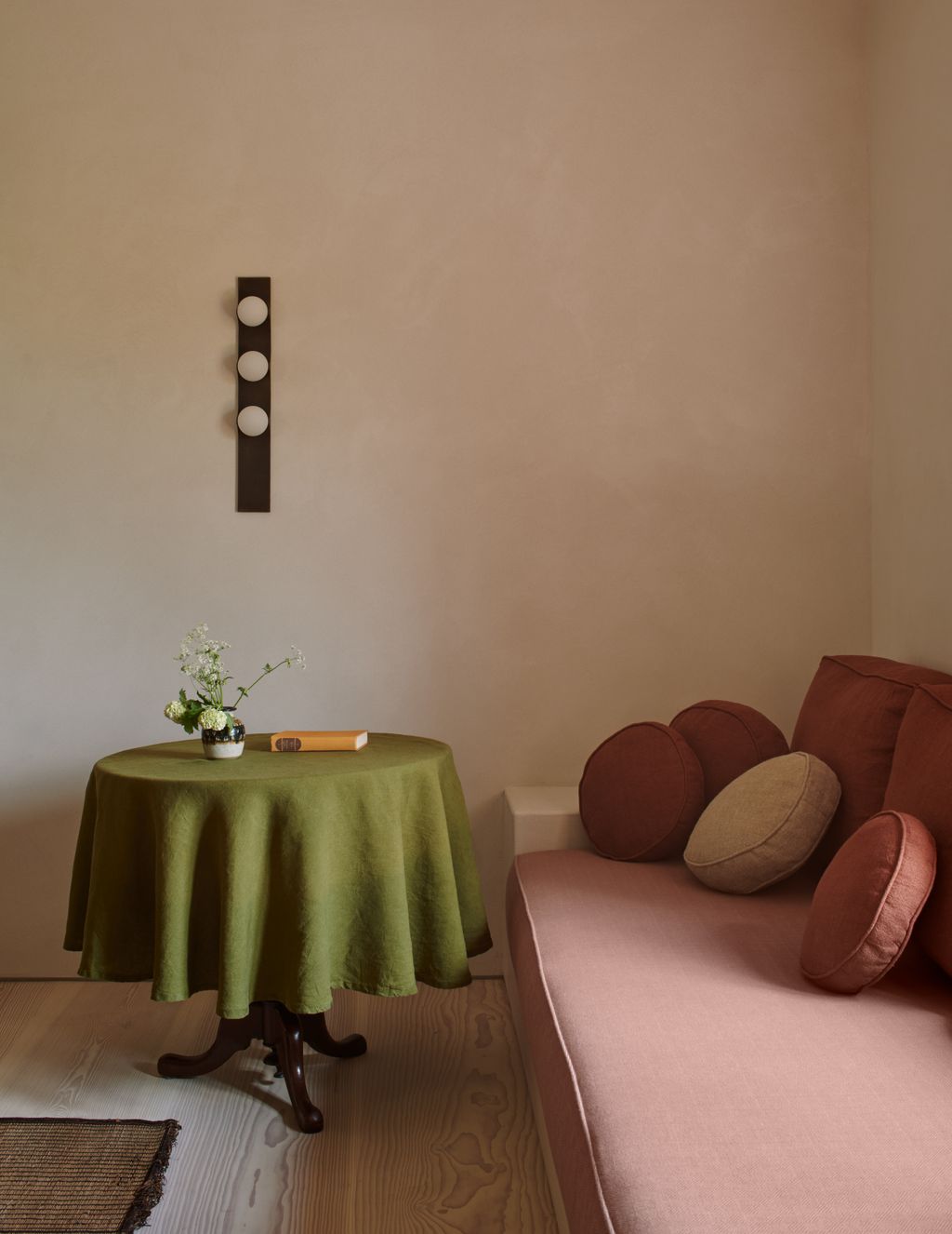 Image may contain Desk Furniture Table Home Decor Couch Tablecloth Cushion Rug Book Publication and Spa
