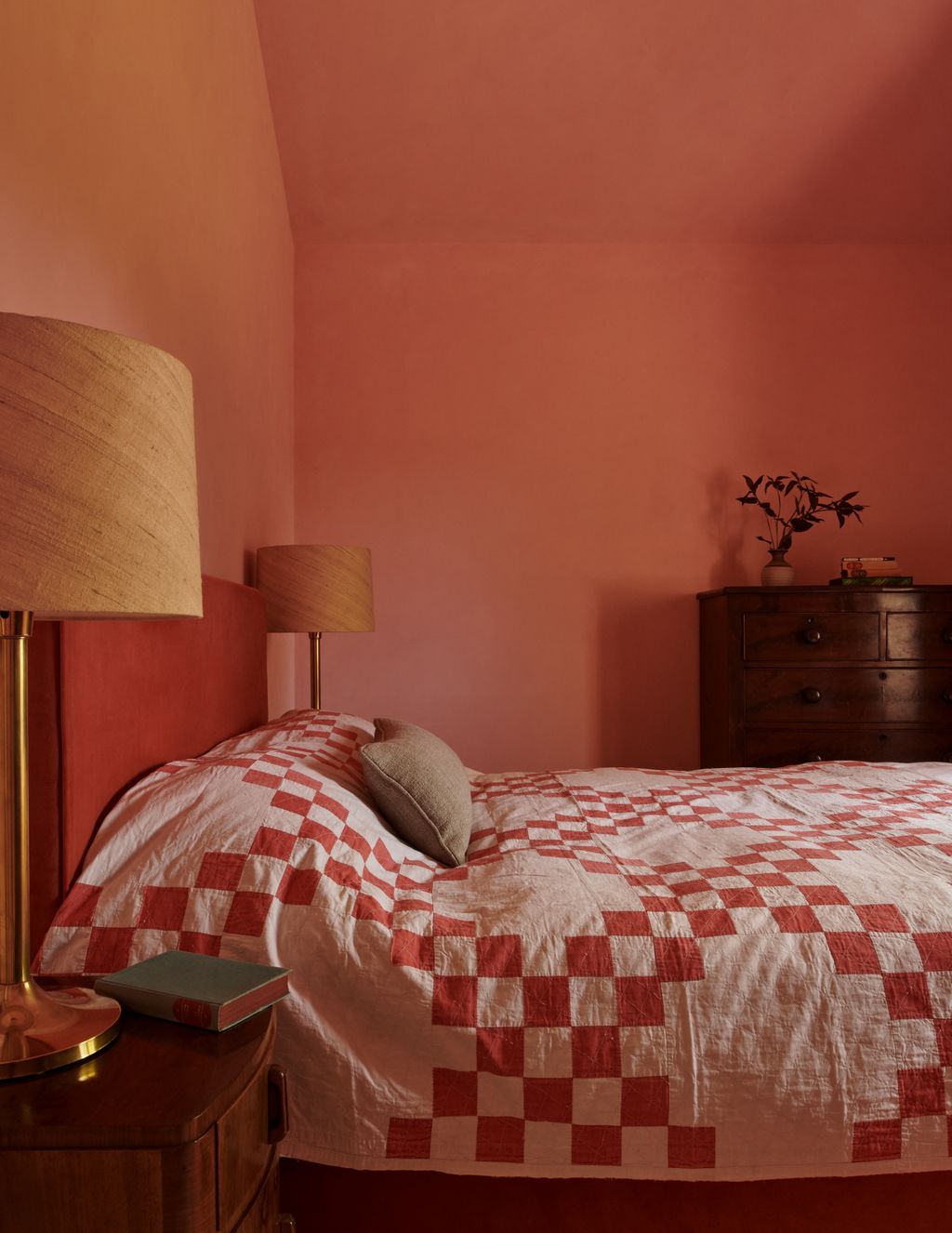 Image may contain Lamp Book Publication Plant Bed Furniture Indoors Interior Design Table Lamp and Cushion