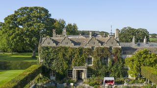 Image may contain Architecture Building Housing House Manor and Plant