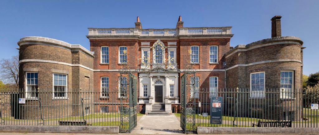 Image may contain Architecture Building Housing House Manor Bench and Furniture