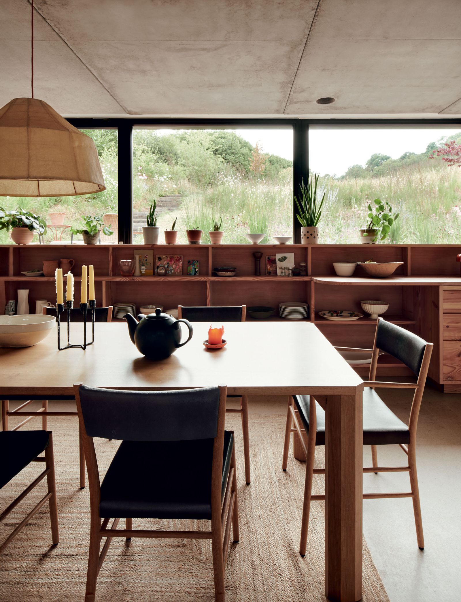 Image may contain Architecture Building Dining Room Dining Table Furniture Indoors Room Table and Interior Design