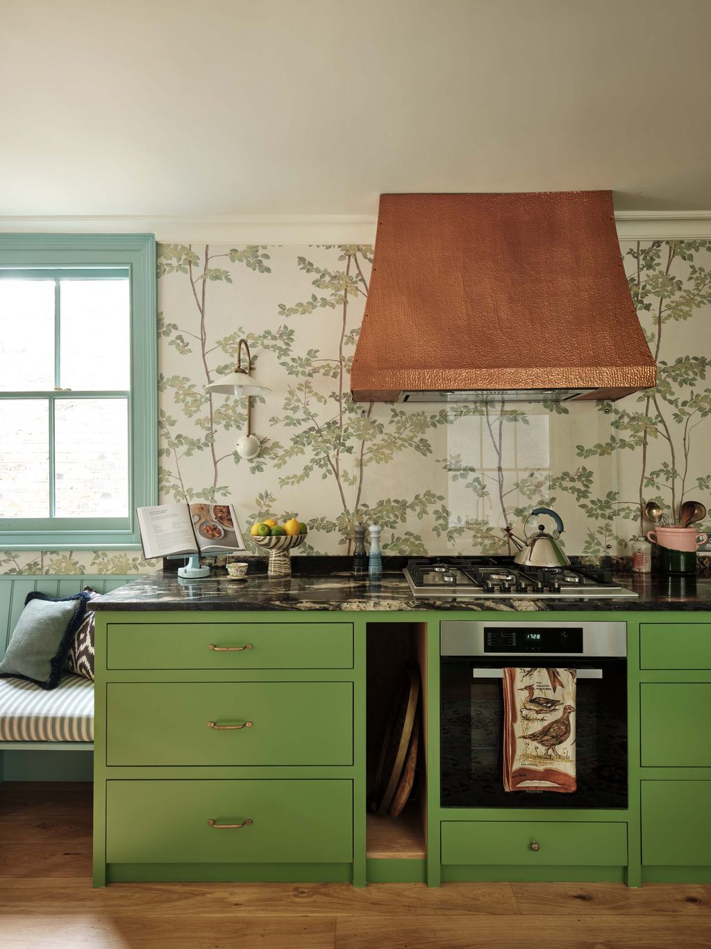 Image may contain Indoors Interior Design Book Publication Kitchen Cooktop Cup Sink Sink Faucet and Furniture