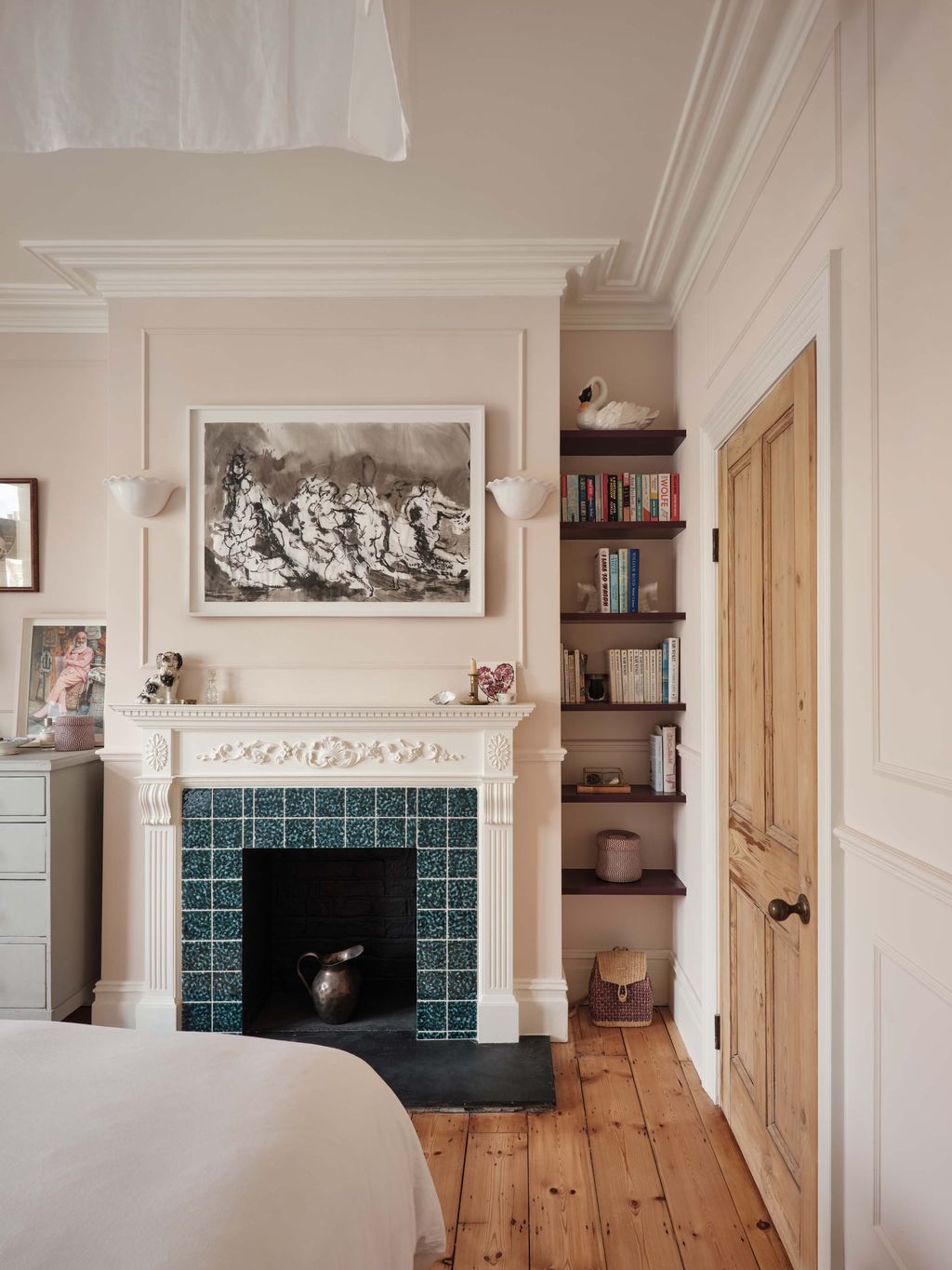 Image may contain Indoors Interior Design Fireplace Accessories Bag Handbag Bed Furniture Art and Painting