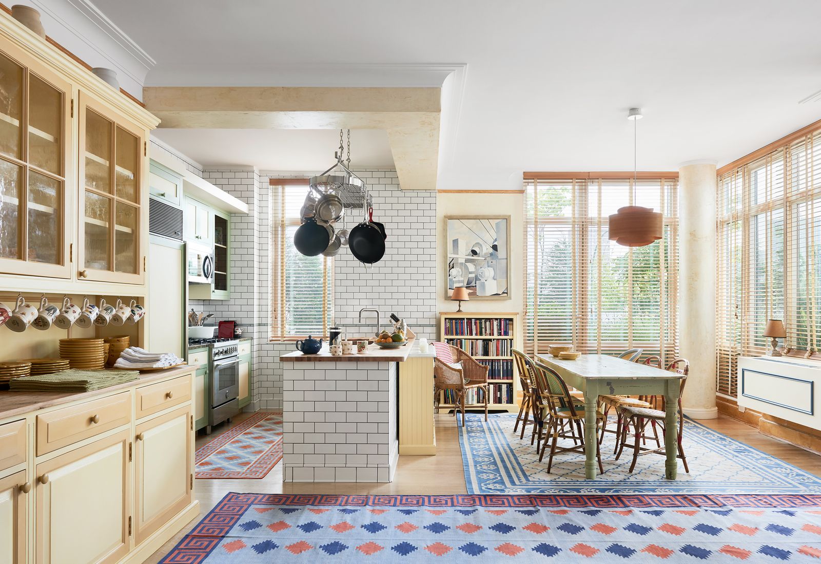 Image may contain Home Decor Indoors Kitchen Interior Design Chair Furniture Rug Architecture and Building