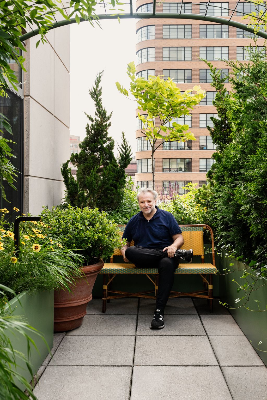 Image may contain Plant Potted Plant Jar Planter Pottery Vase Person Sitting Tree Herbal Herbs and Adult
