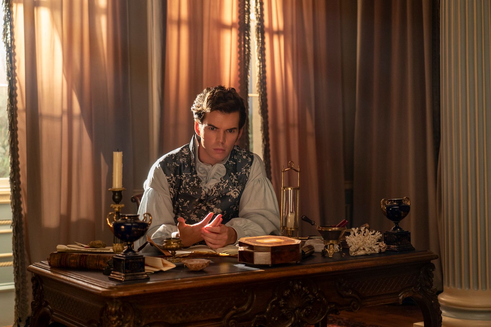 Image may contain Person Teen Furniture Table Desk Architecture Building Dining Room Dining Table Indoors and Room