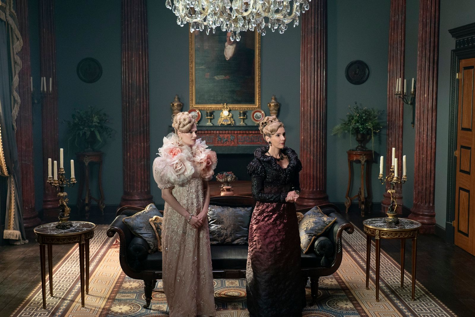 Image may contain Person Plant Lamp Adult Wedding Art Painting Chair Furniture Desk Table Candle and Couch