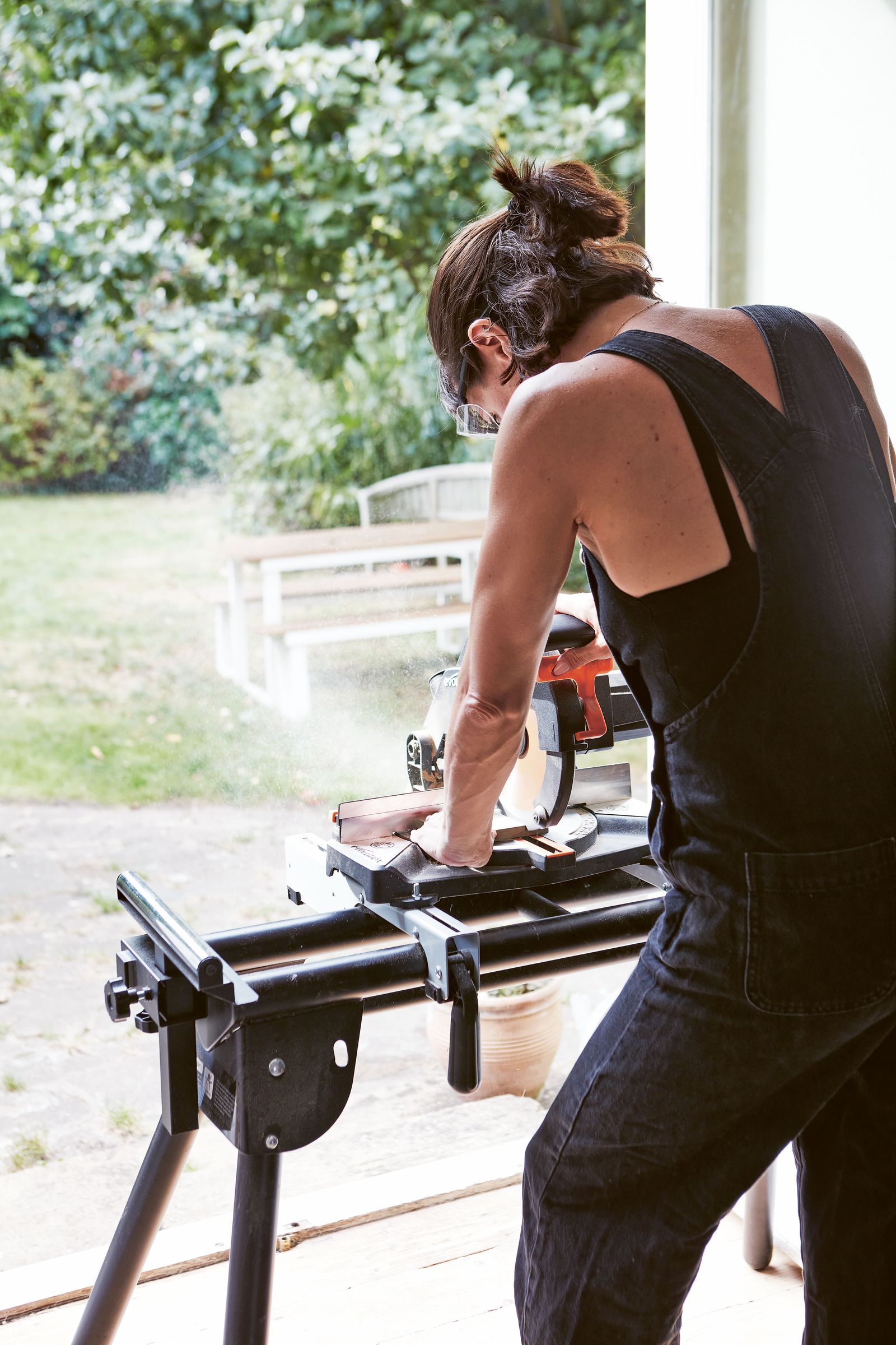 Image may contain Adult Person Bench and Furniture