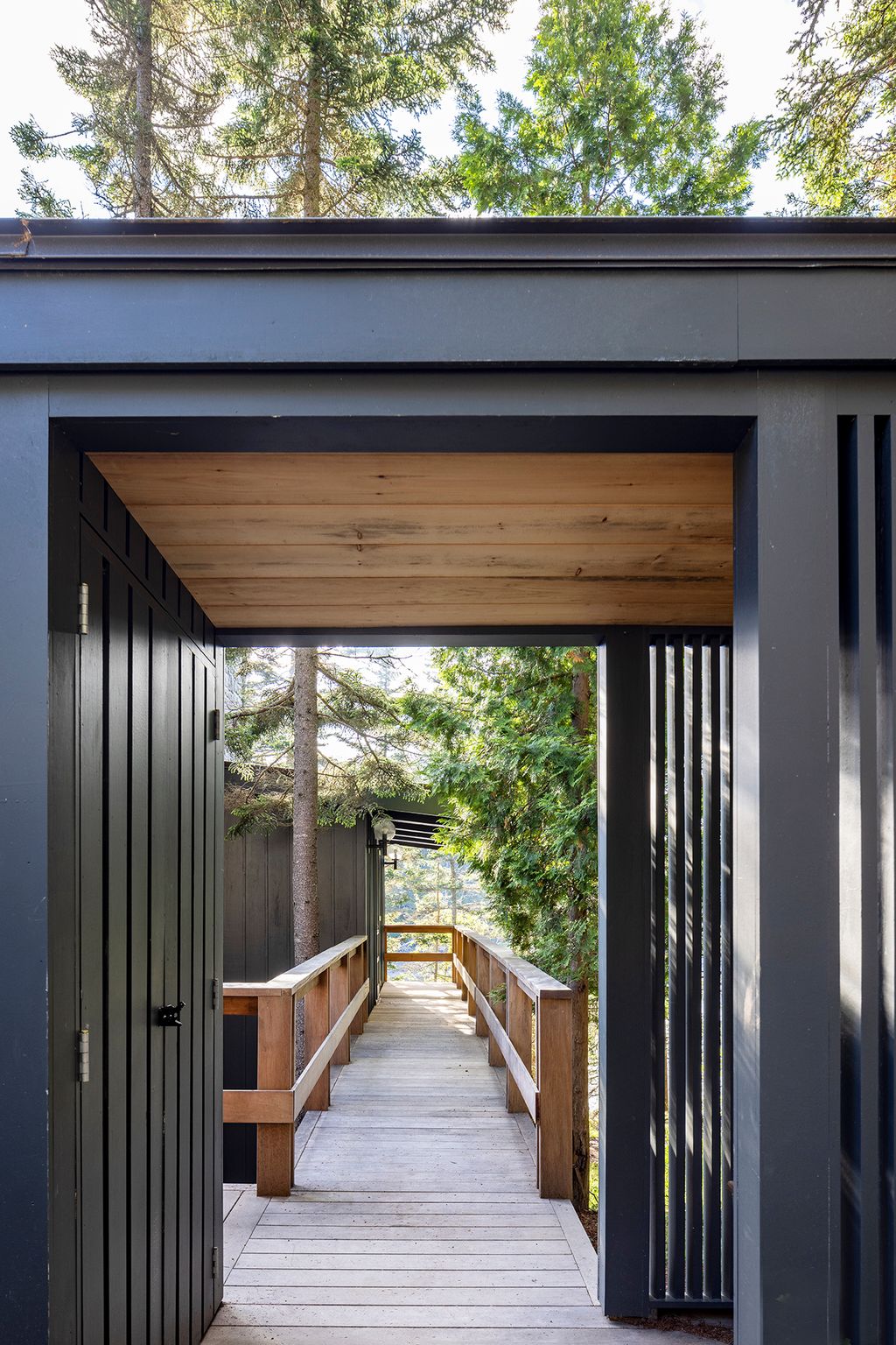 Image may contain Indoors Interior Design Wood Hardwood Bench Furniture Stained Wood Outdoors and Architecture