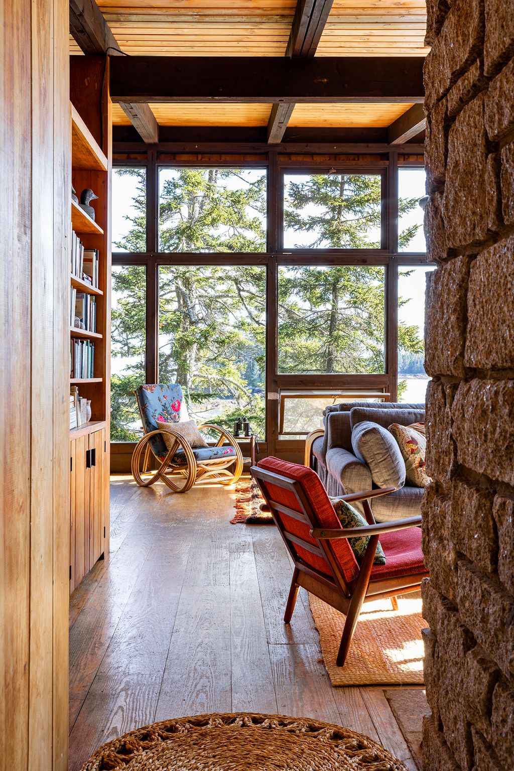 Image may contain Indoors Interior Design Floor Wood Chair Furniture Hardwood Flooring Home Decor and Stained Wood