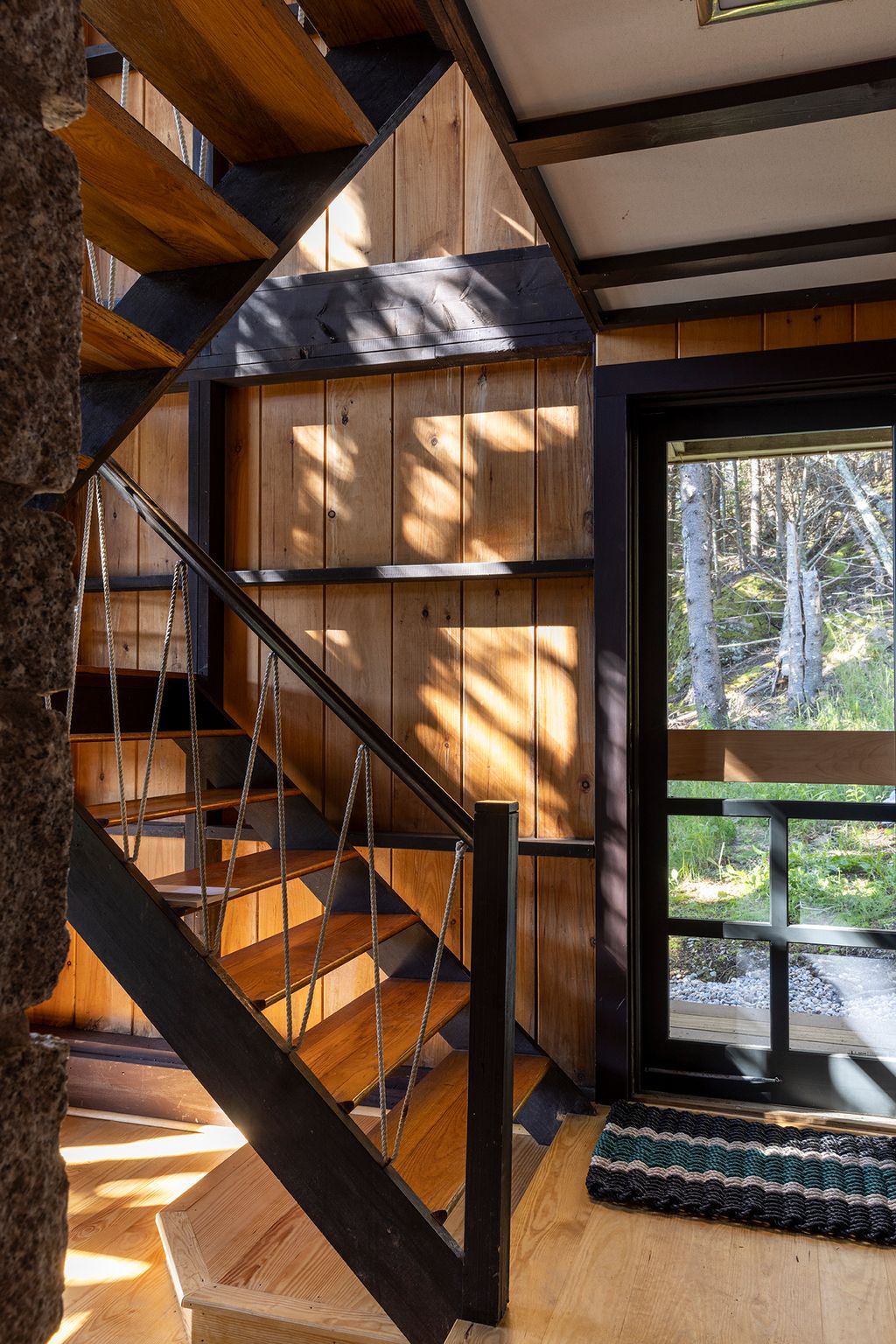 Image may contain Indoors Interior Design Architecture Building House Housing Staircase Wood and Hardwood