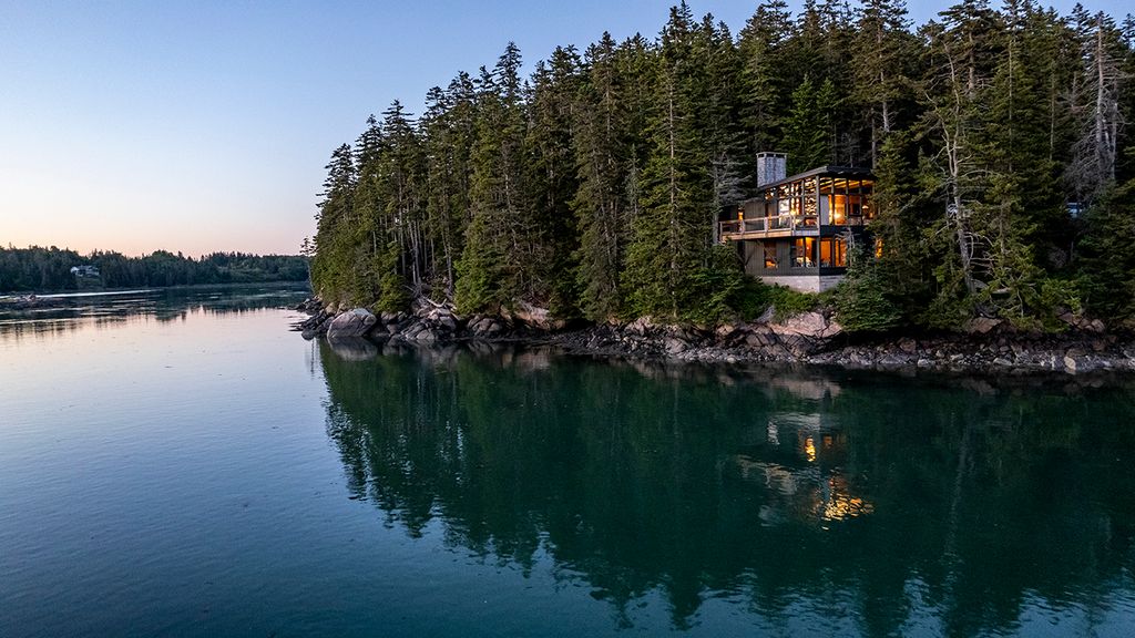 Image may contain Nature Outdoors Scenery Lake Water Lakefront Land Plant and Vegetation