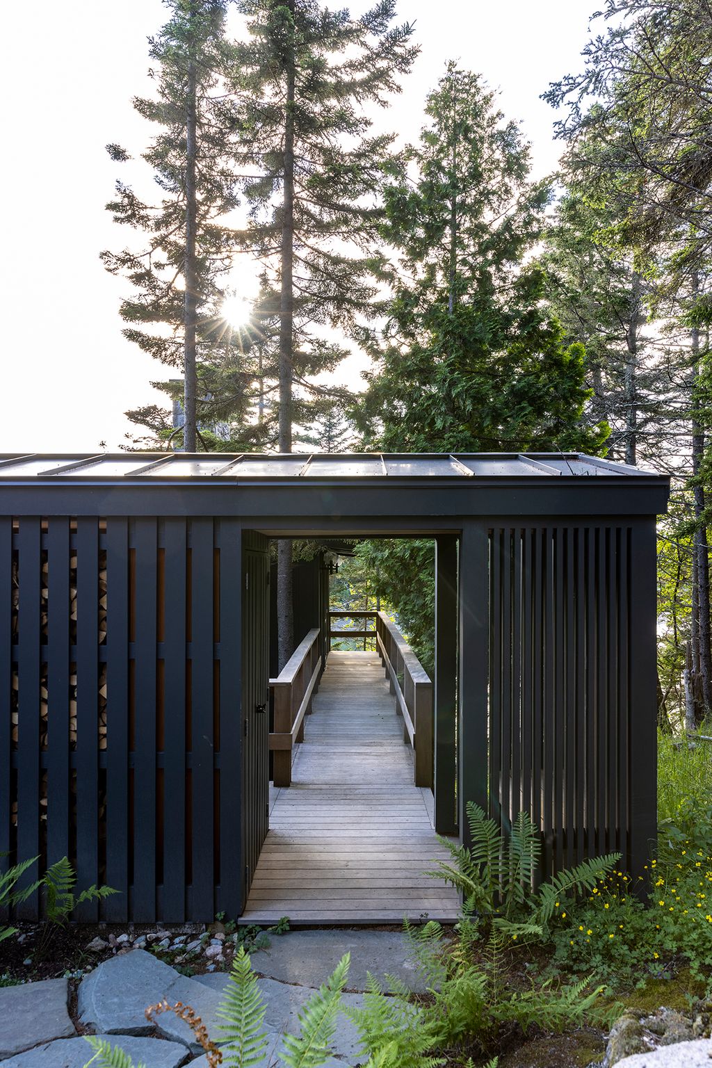 Image may contain Plant Tree Fir Vegetation Outdoors Architecture Building House Housing Porch Nature and Scenery