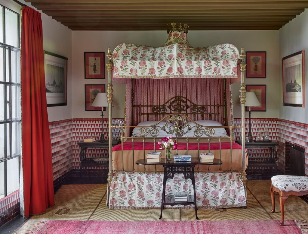 Image may contain Furniture Bed Bedroom Indoors Room Lamp Art Painting Chair Canopy Bed Home Decor and Rug