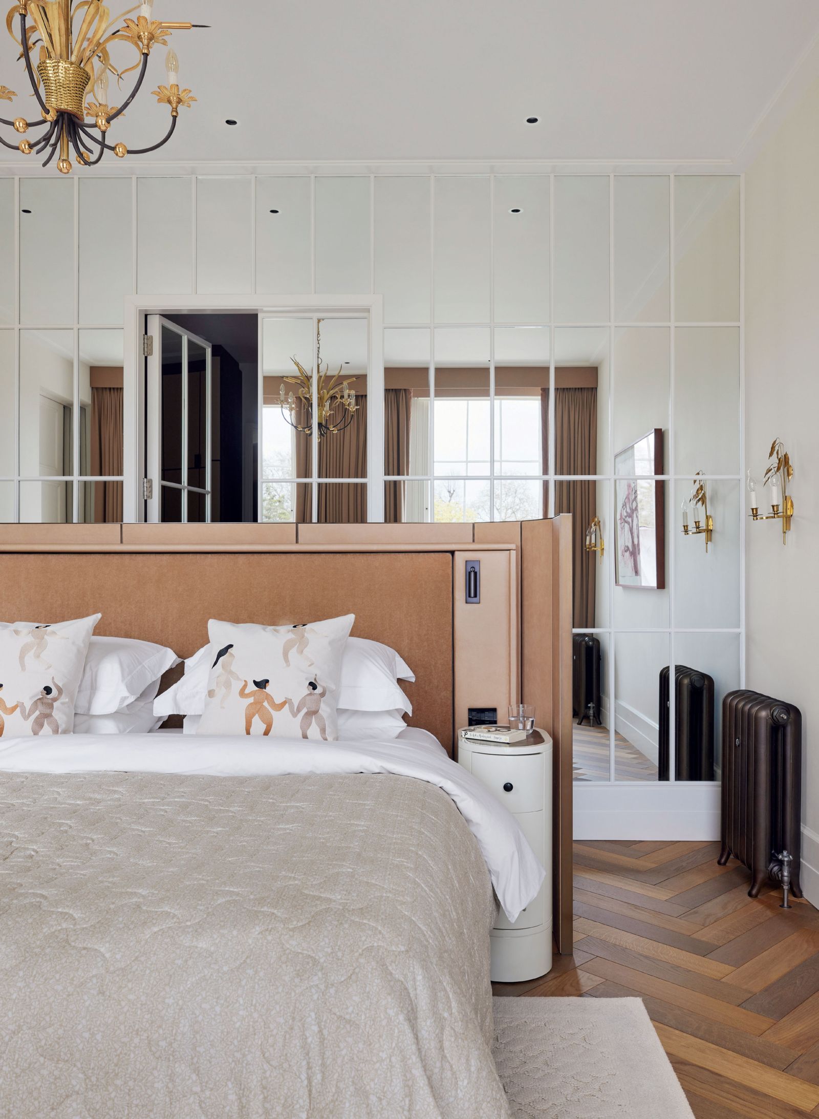 Image may contain Indoors Interior Design Lamp Home Decor Bed Furniture Rug Cushion Bedroom Room Art and Painting