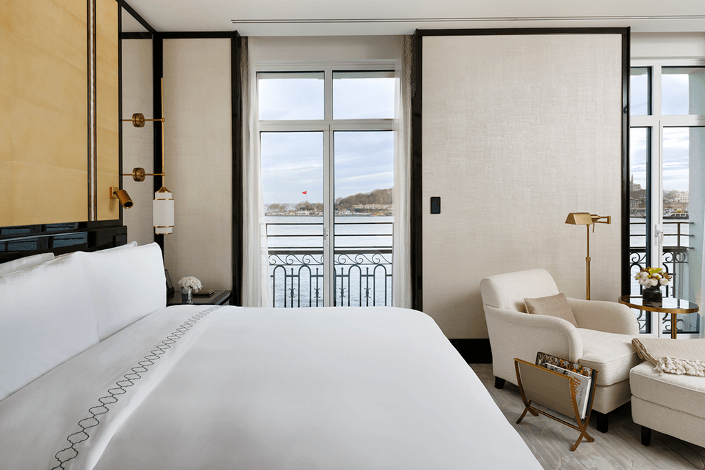 Image may contain Indoors Interior Design Bed Furniture Door French Window Window Home Decor and Architecture