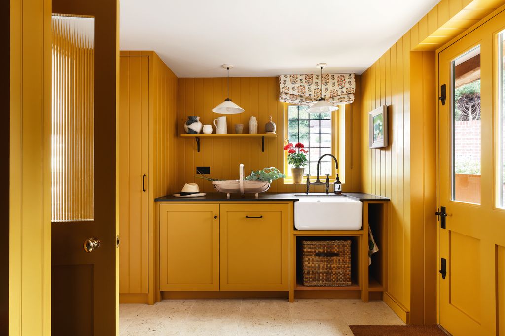 Image may contain Indoors Interior Design Corner Sink Lamp Sink Faucet Cup Art Painting Home Decor and Rug