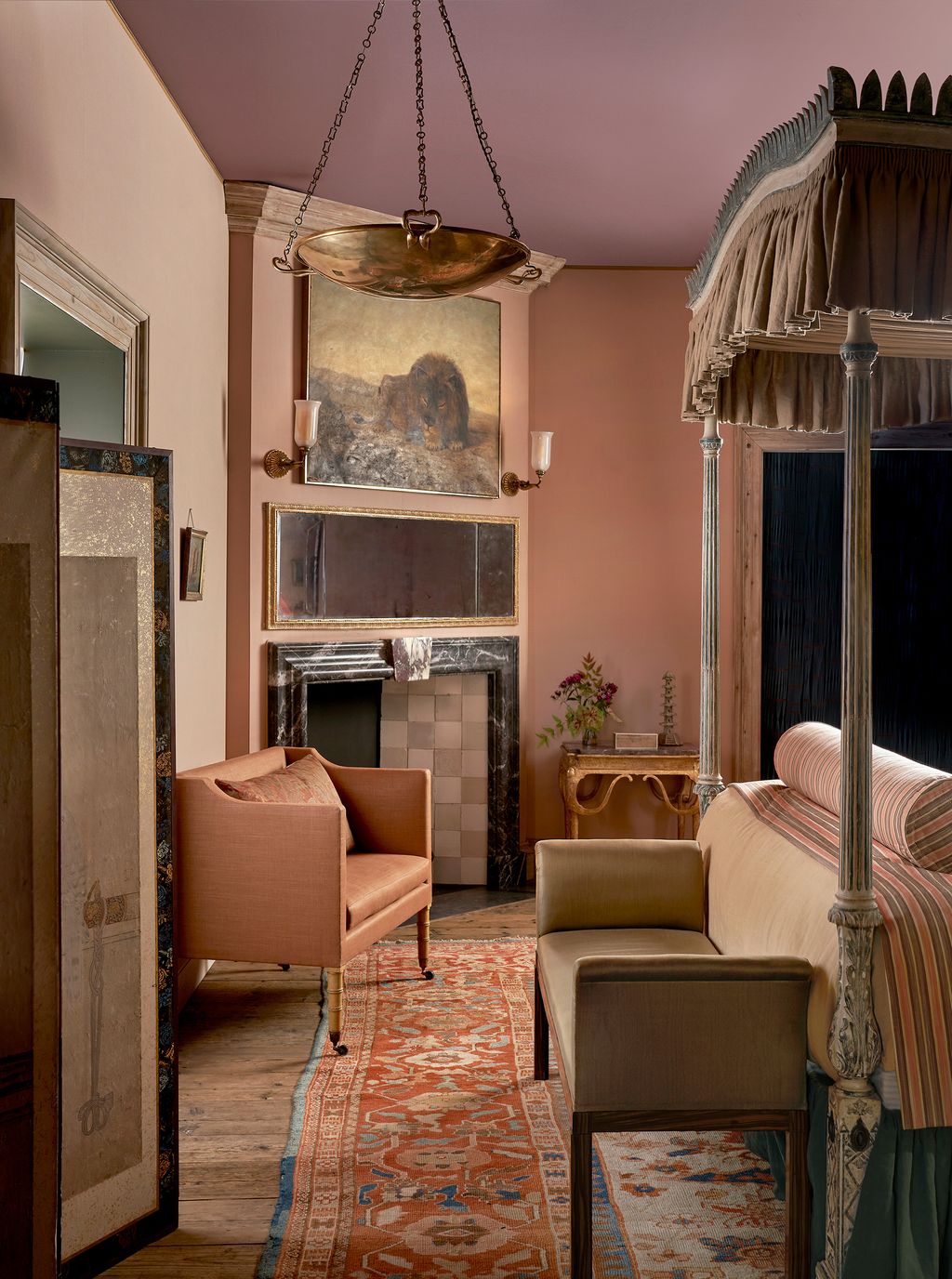 Image may contain Home Decor Lamp Furniture Indoors Chair Bed Bedroom Room Rug Art Painting and Architecture