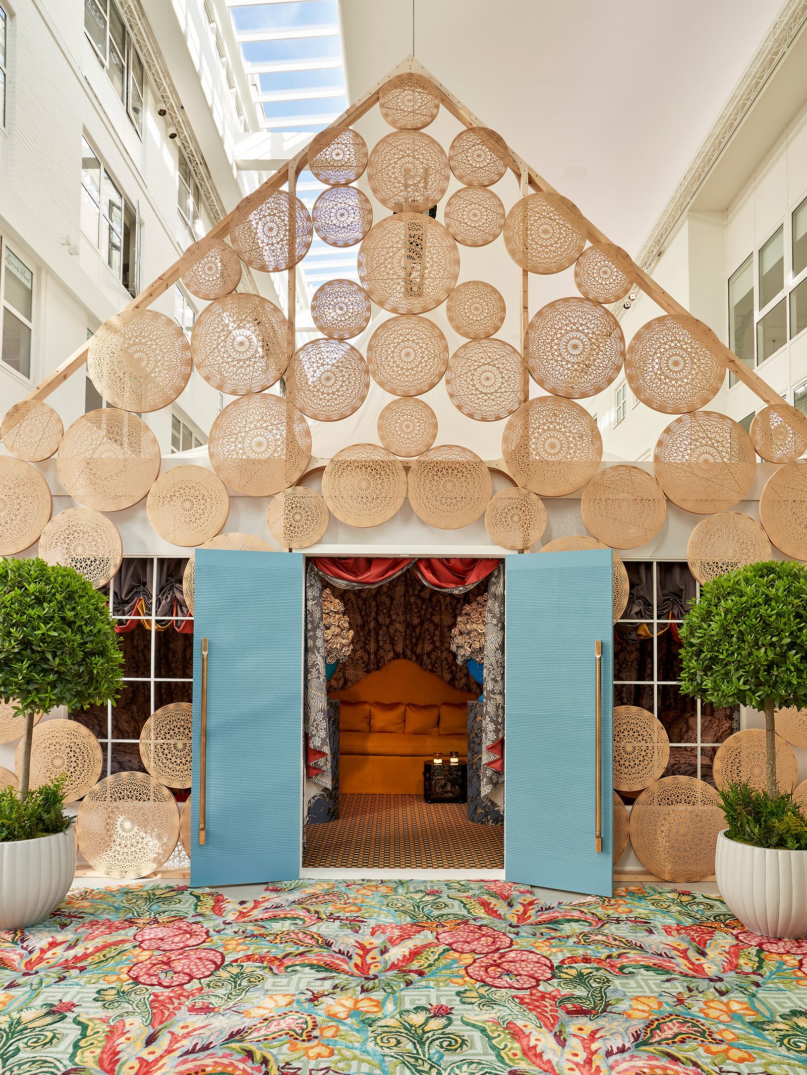 Image may contain Indoors Interior Design Home Decor Plant Accessories Bag Handbag Couch and Furniture