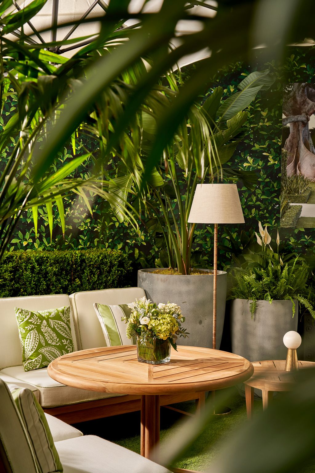 Image may contain Furniture Table Tabletop Lamp Indoors Interior Design Desk Plant Potted Plant and Coffee Table