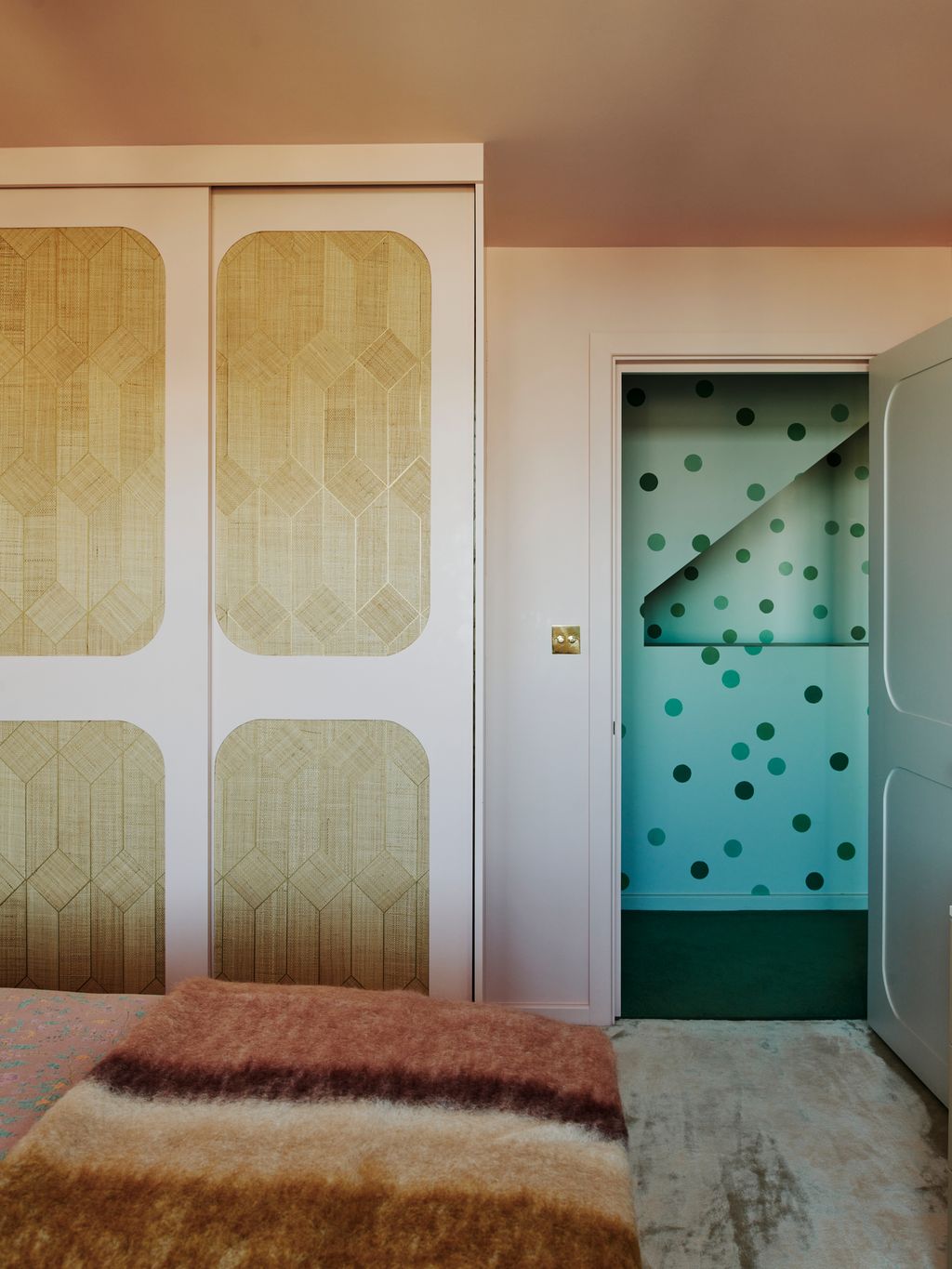 Image may contain Door Indoors Interior Design Corner Home Decor Bed Furniture and Rug