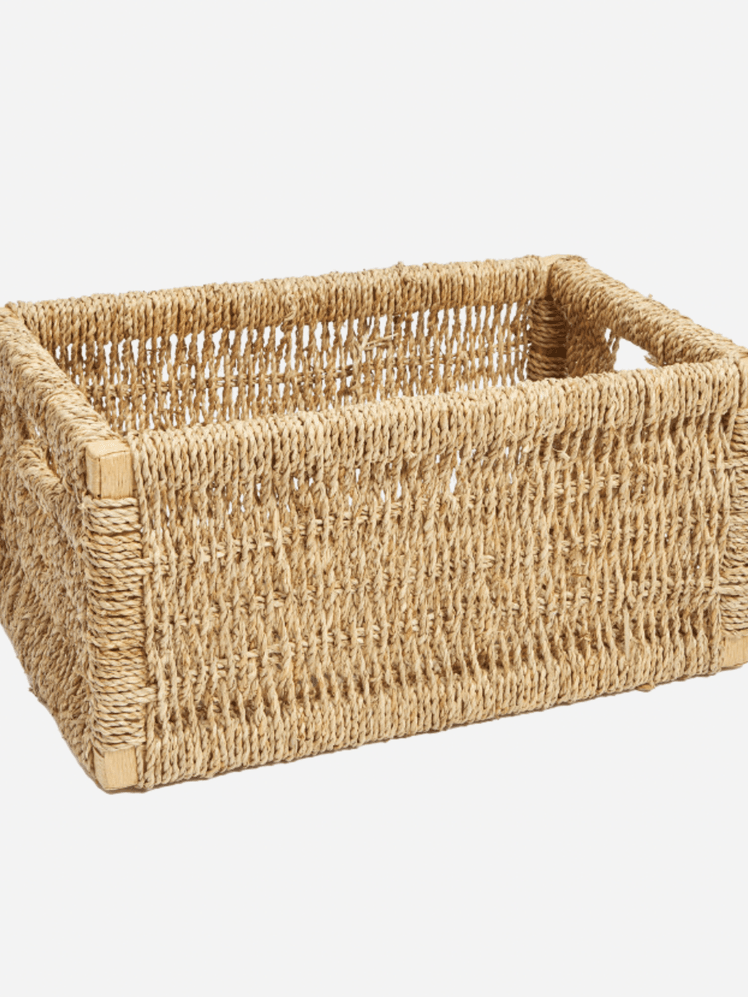 Image may contain: Woven, Basket, Crib, Furniture, and Infant Bed