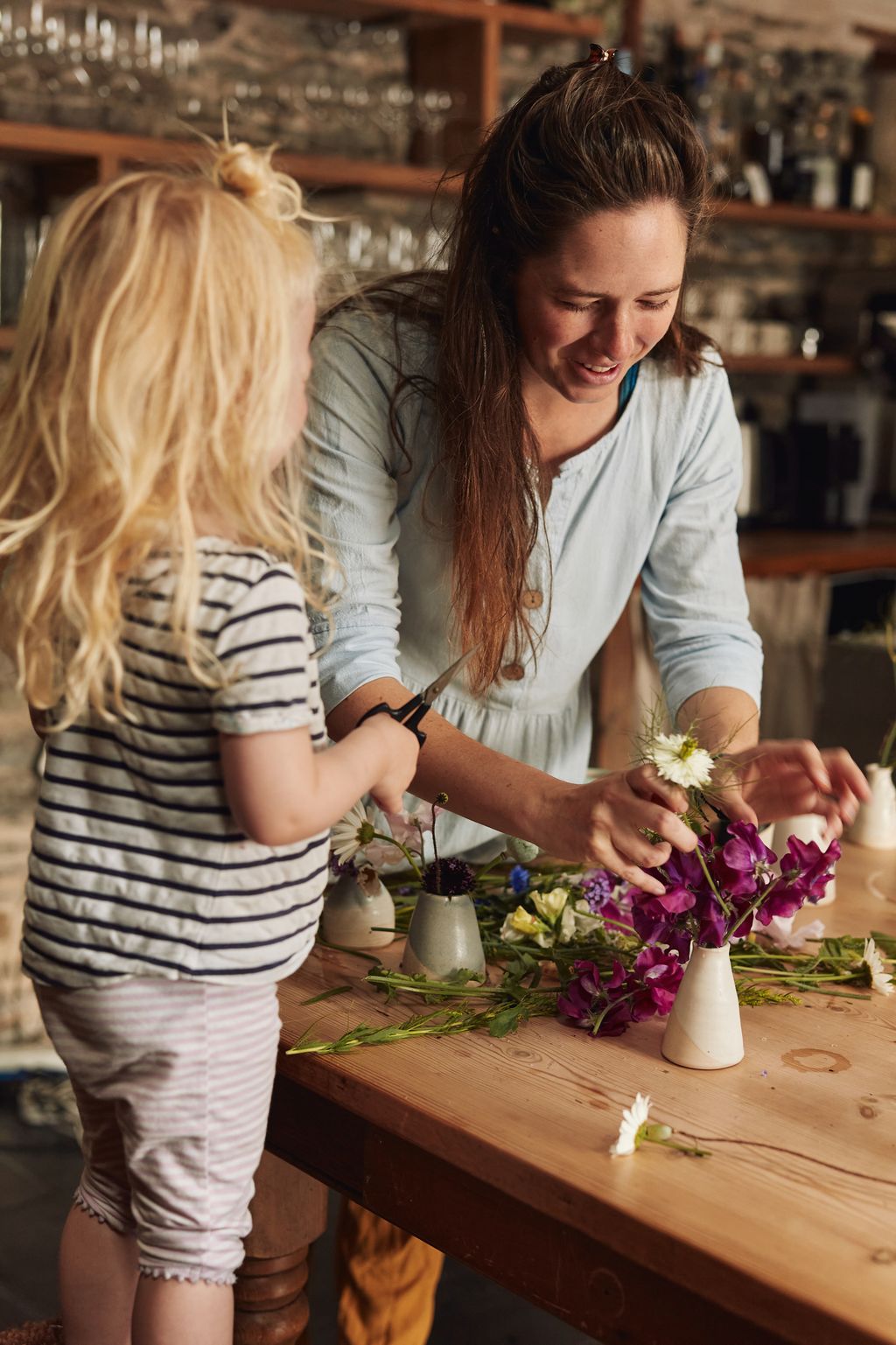 Image may contain Child Person Adult Scissors and Weapon