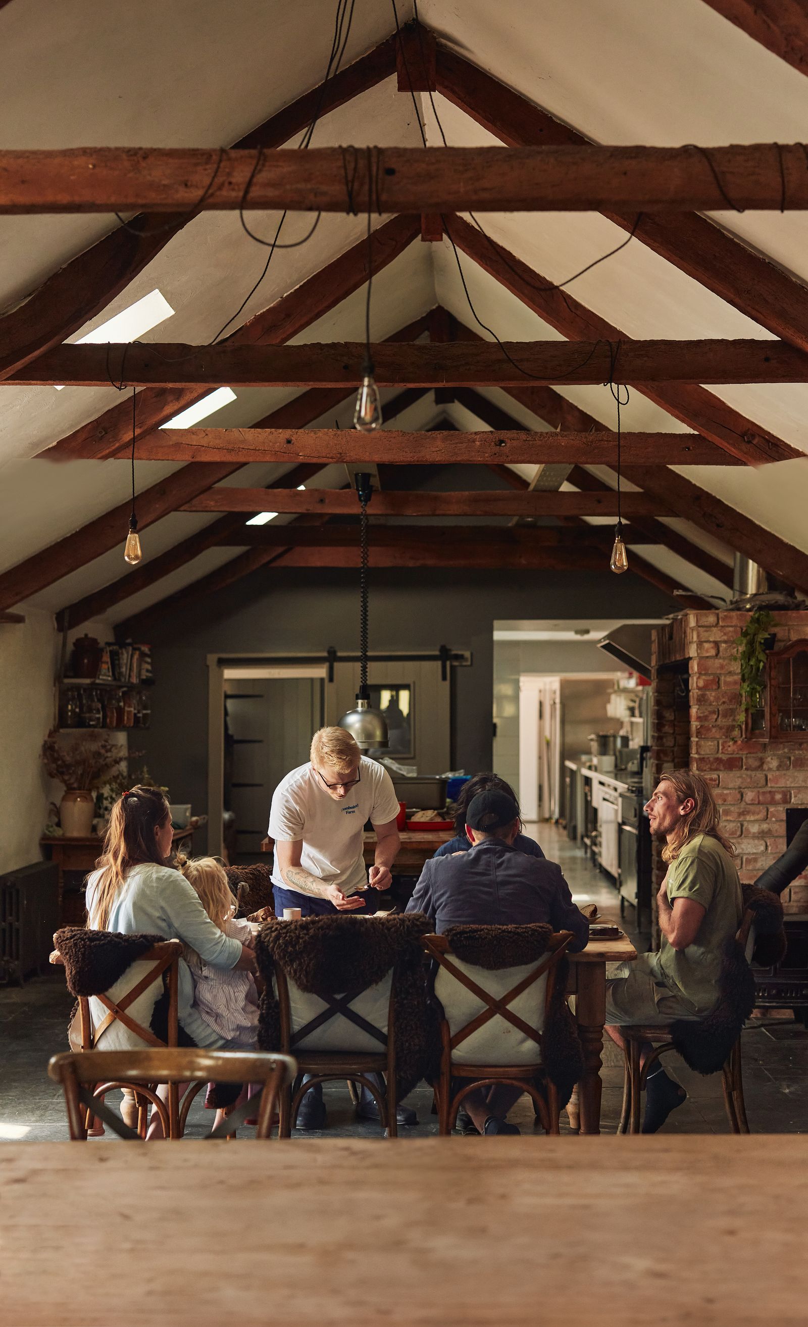 Image may contain Architecture Building Dining Room Dining Table Furniture Indoors Room Table Restaurant and Wood