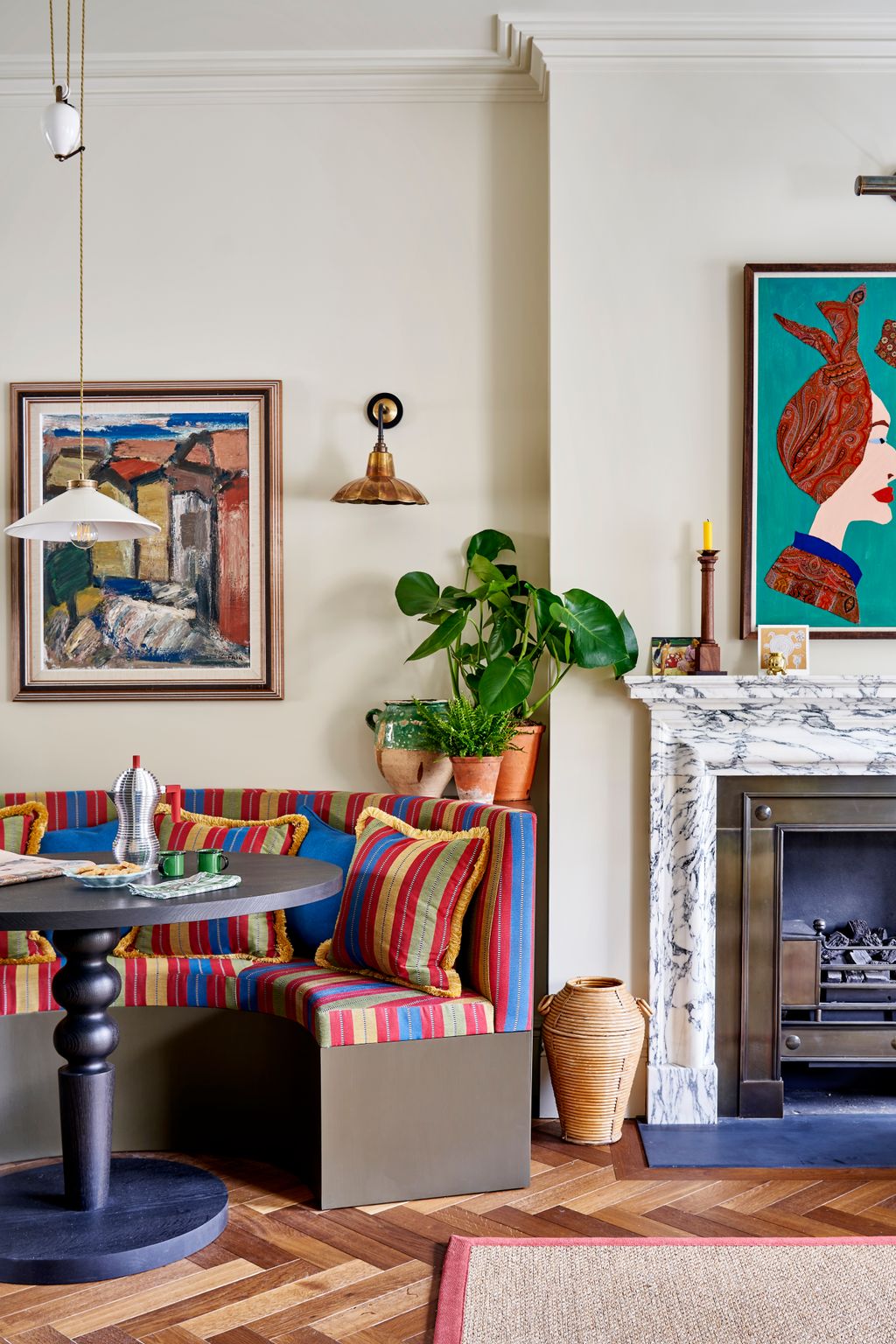 Image may contain Home Decor Indoors Interior Design Plant Architecture Building Furniture Living Room Room and Rug