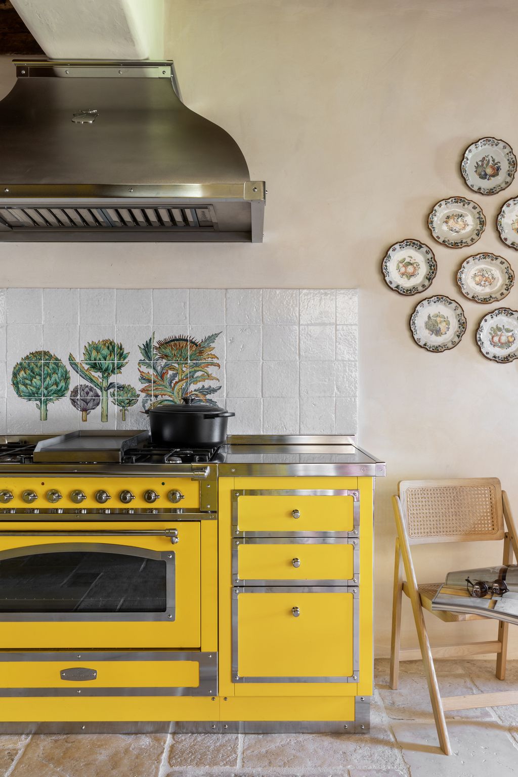 Image may contain Indoors Interior Design Kitchen Chair Furniture Plate Accessories and Glasses