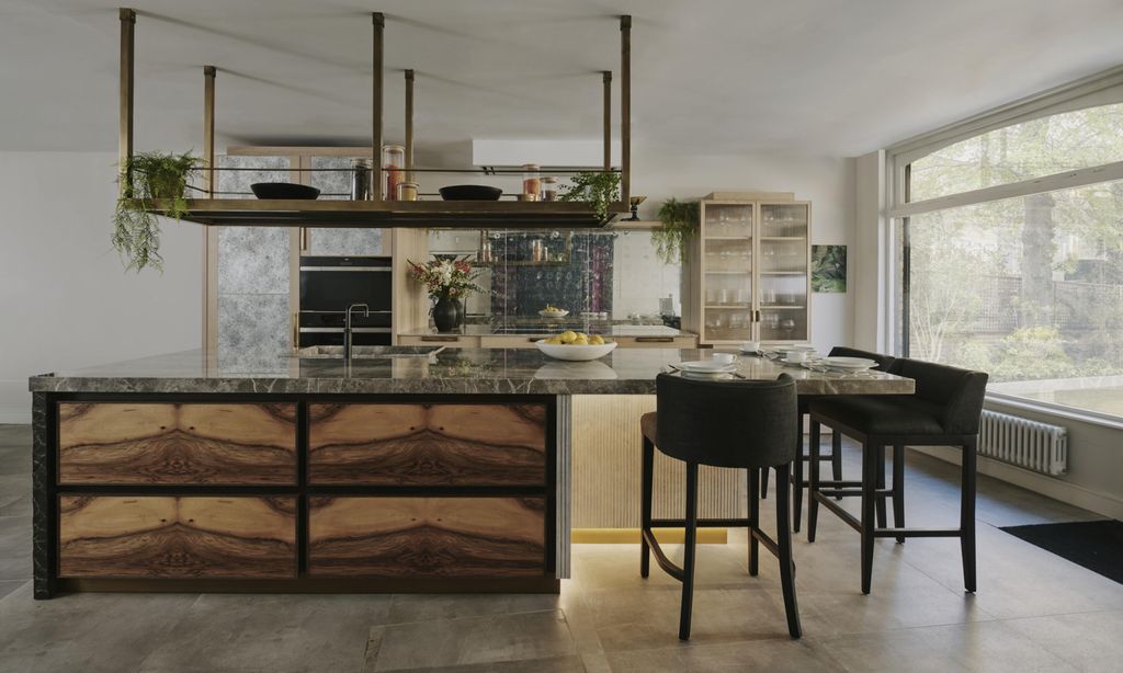 Image may contain Indoors Interior Design Kitchen Kitchen Island Plant Chair Furniture Dining Table and Table