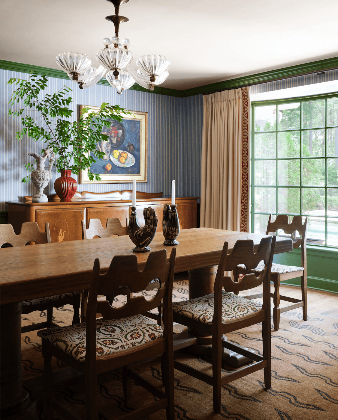 Image may contain Architecture Building Dining Room Dining Table Furniture Indoors Room Table Chandelier and Lamp