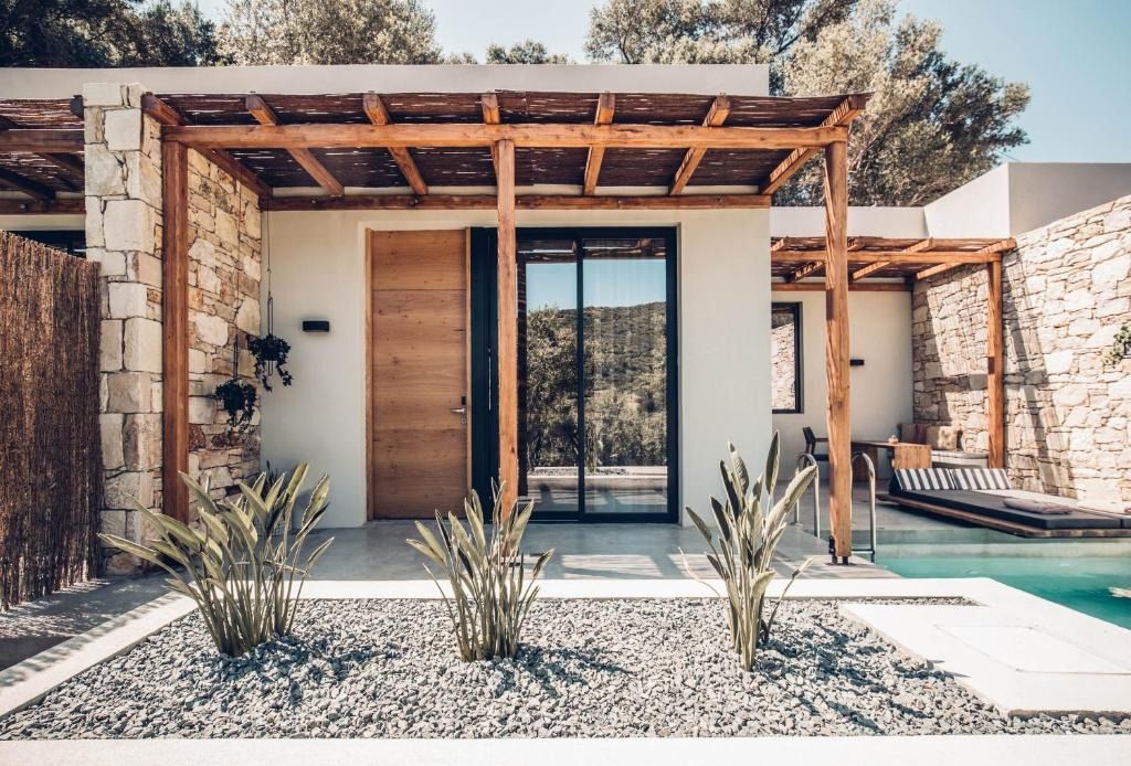 Image may contain Indoors Interior Design Architecture Building House Housing Villa Porch Pool and Water