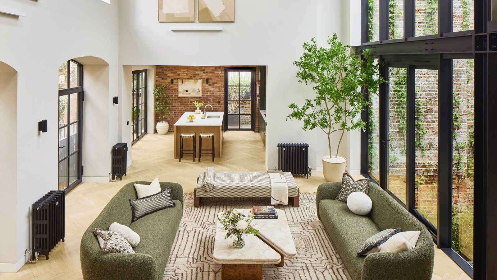 Image may contain Plant Book Publication Home Decor Couch Furniture Architecture Building Indoors and Living Room