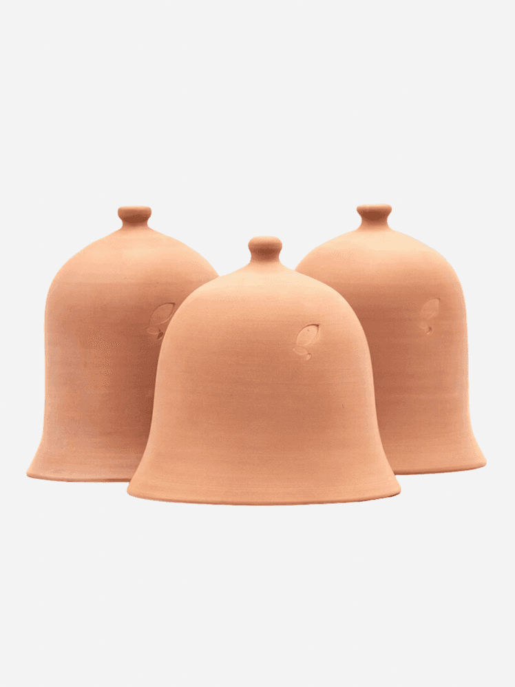 Image may contain: Pottery, Jar, Cookware, and Pot