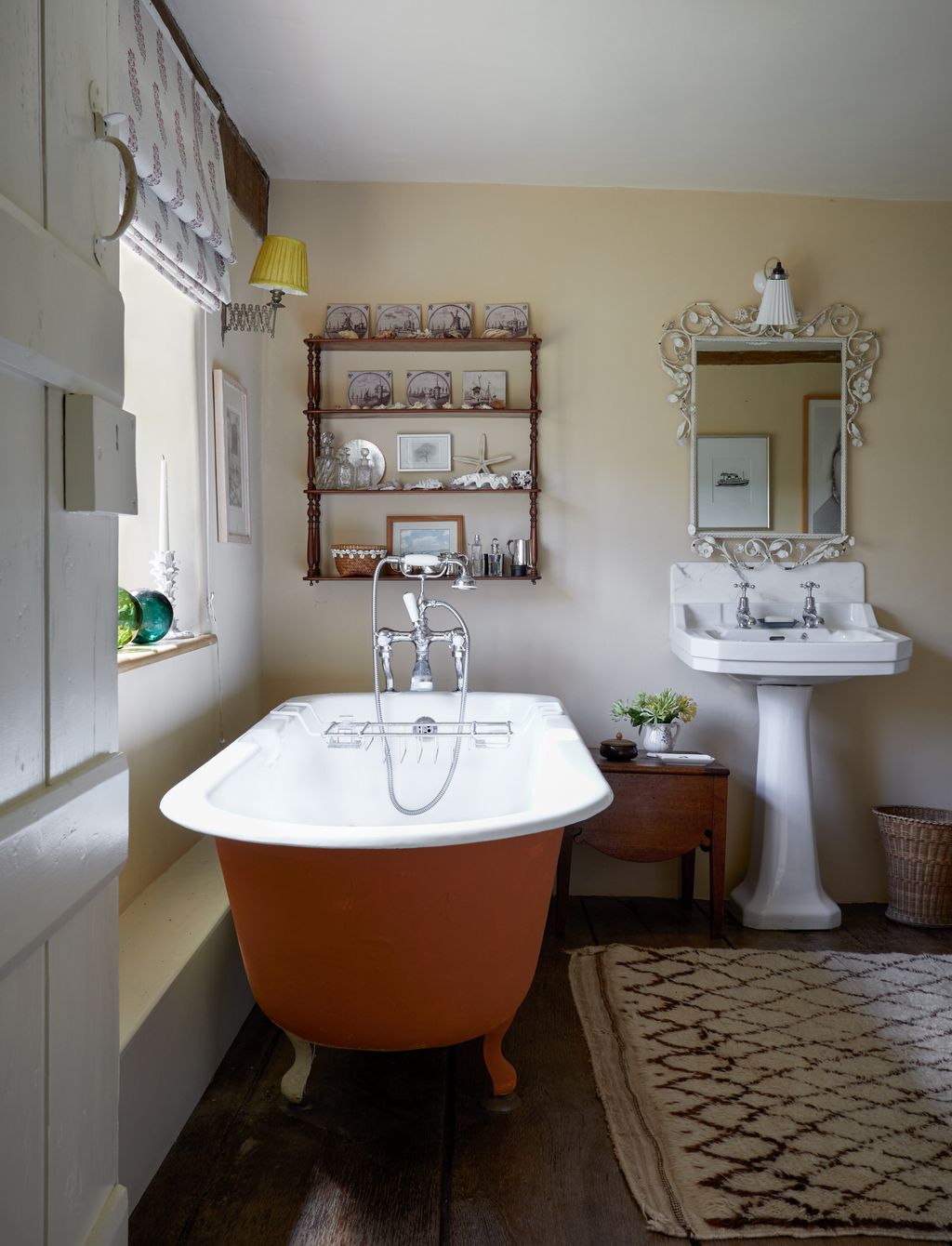 Image may contain Lamp Home Decor Rug Plant Bathing Art Painting Bathtub Person Tub Sink Sink Faucet and Plate