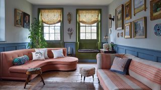 Image may contain Home Decor Couch Furniture Architecture Building Indoors Living Room Room Lamp Rug and Cushion