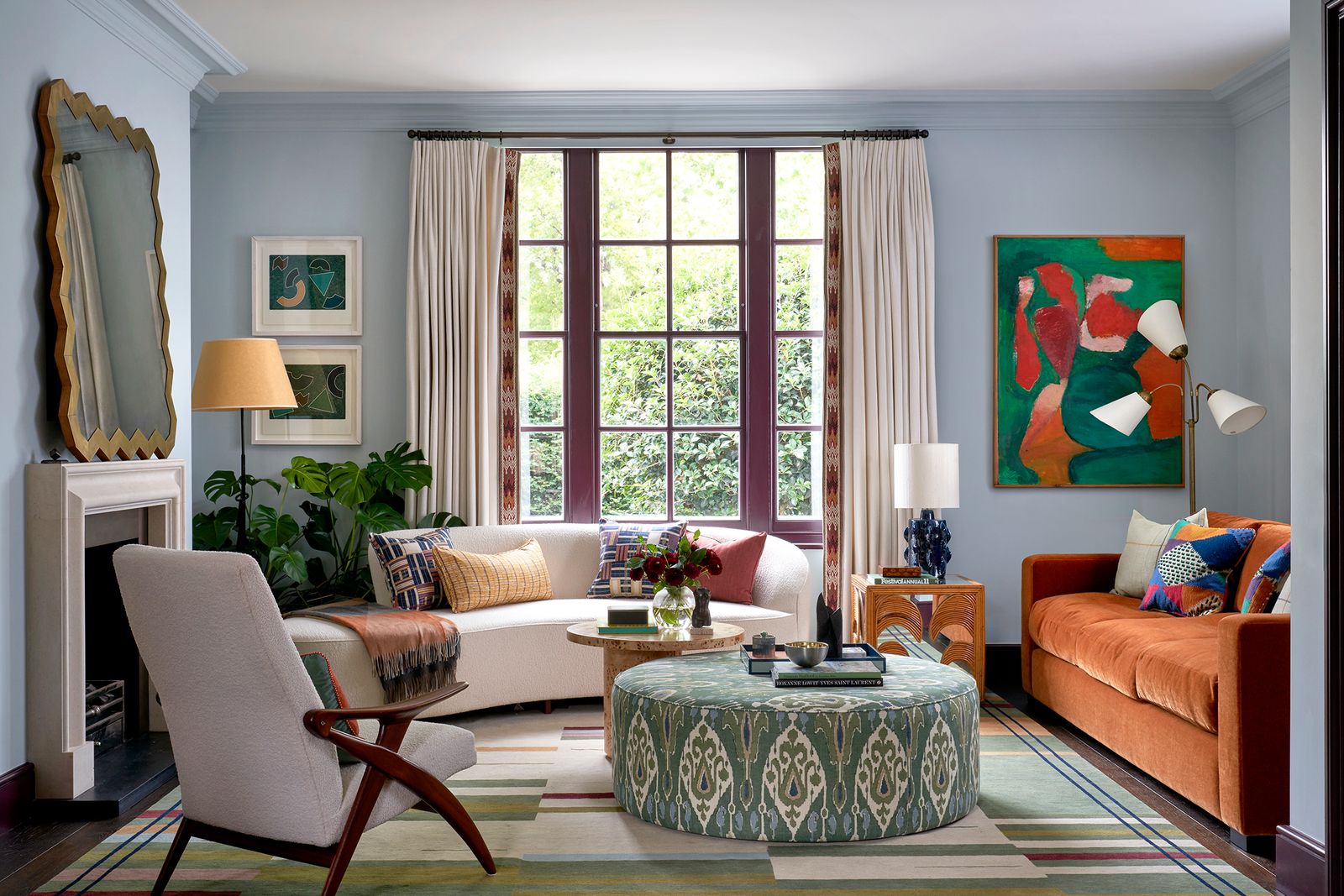 Image may contain Home Decor Lamp Couch Furniture Chair Architecture Building Indoors Living Room Room and Rug