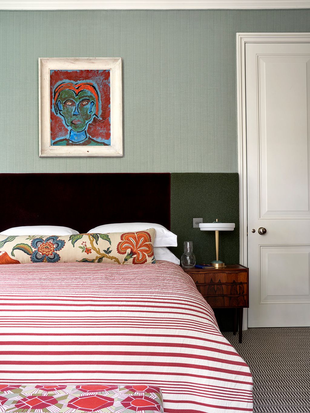 Image may contain Indoors Interior Design Bed Furniture Home Decor Cushion Lamp Art Painting Bedroom and Room